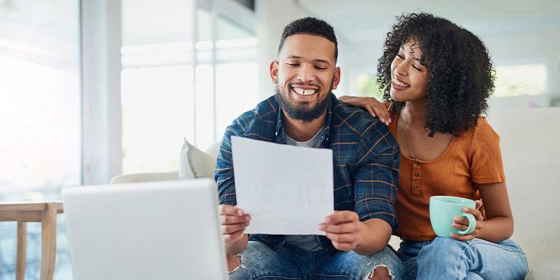 A couple reading about out-of-pocket expenses