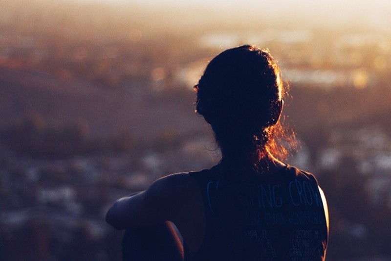 Woman peering into the distance