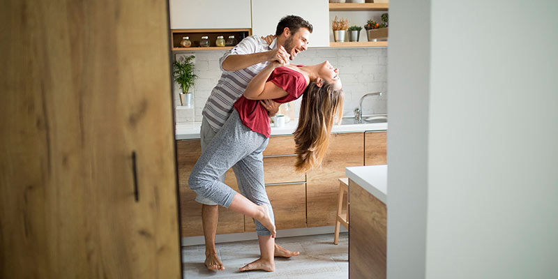 A couple embracing and laughing