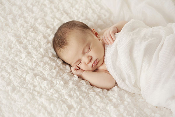 A sleeping newborn A sleeping newborn