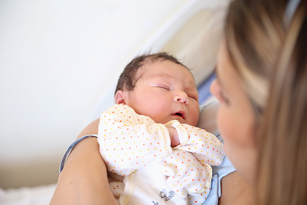 A mother and newborn baby A mother and newborn baby