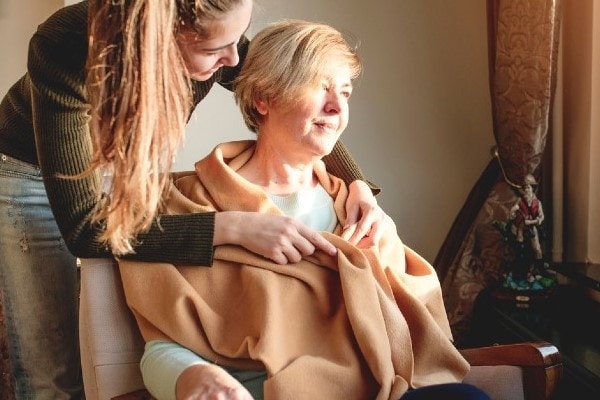 close up of palliative care patient being  cared for