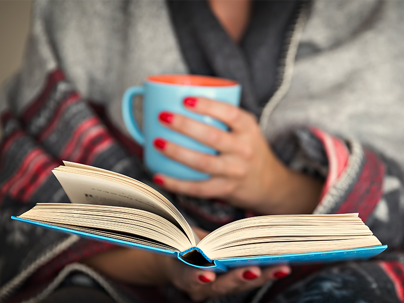 person doing knee strengthening exercises with a physio in their home