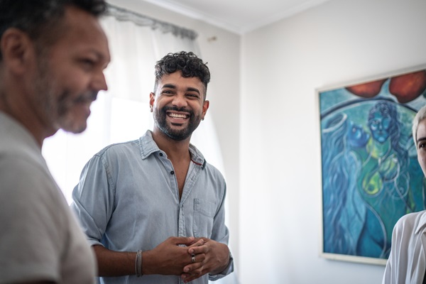 Friends talking in living room