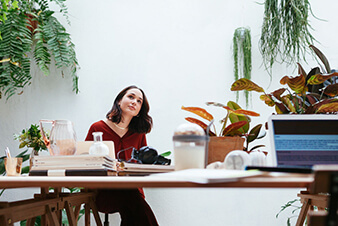 Young woman working in her desk Young woman working in her desk