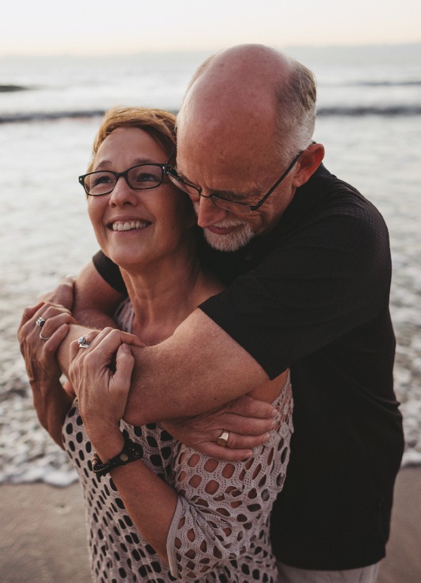 Elderly couple by the beach