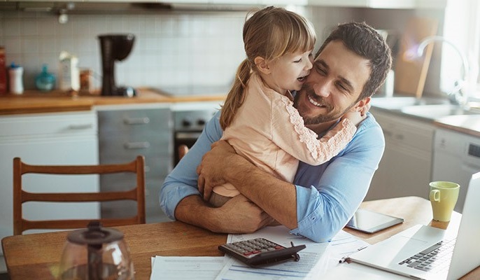 Father hugs his daughter