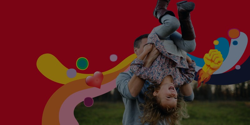 daughter and dad playing outdoors