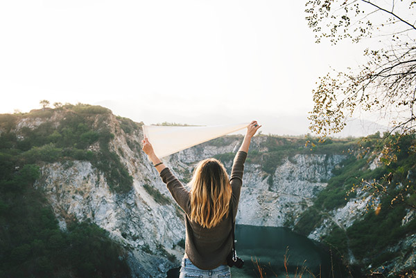 female traveling in mountains