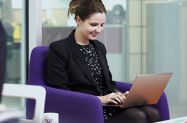 A woman completing a hospital claim