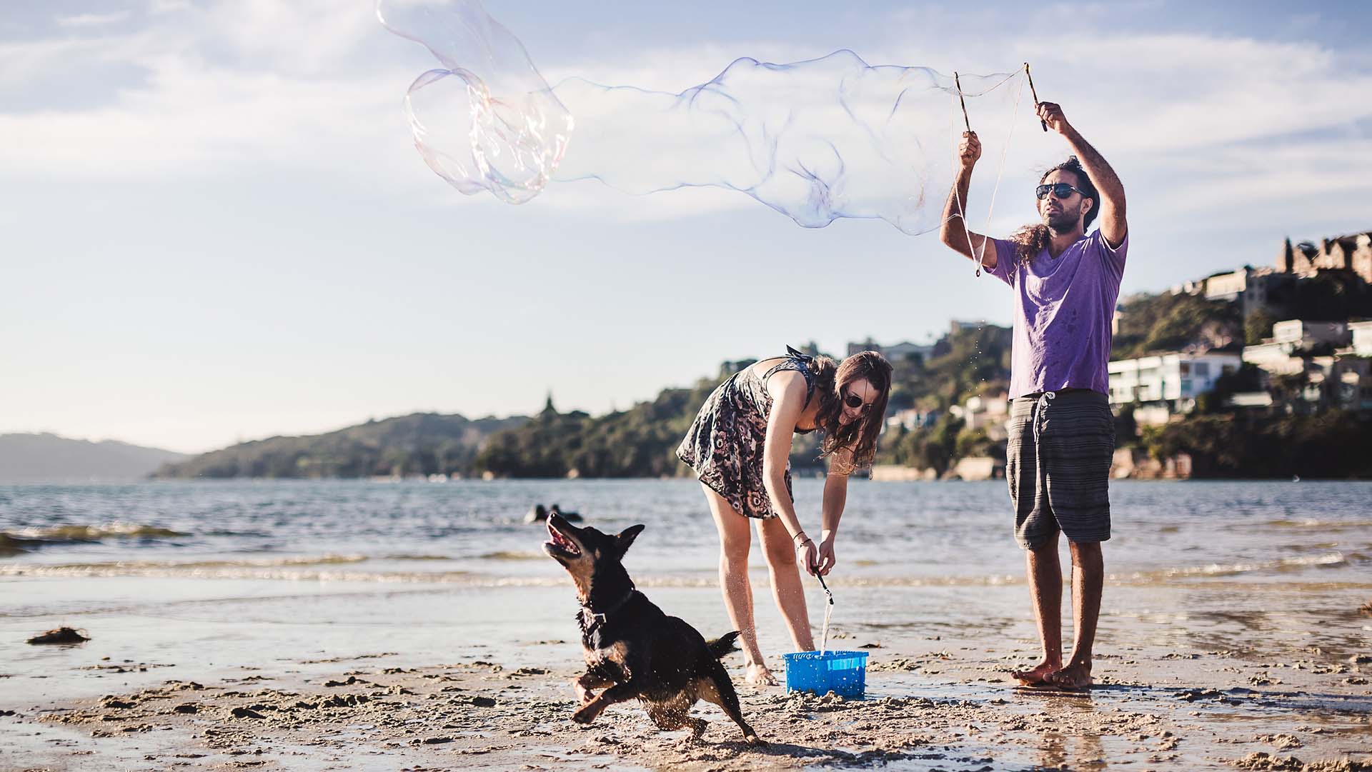 people playing with soap bubbles