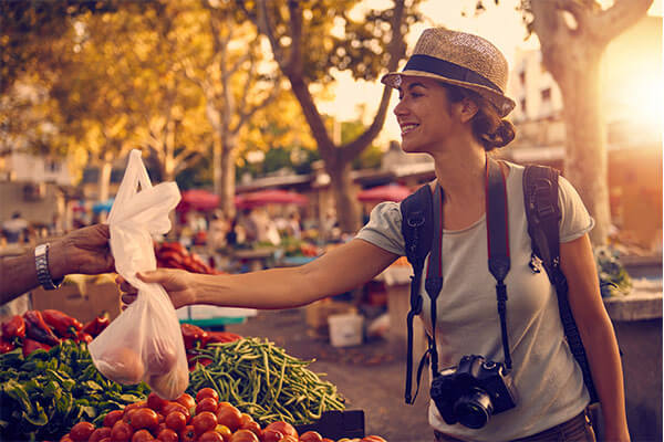 female tourist grocery shopping